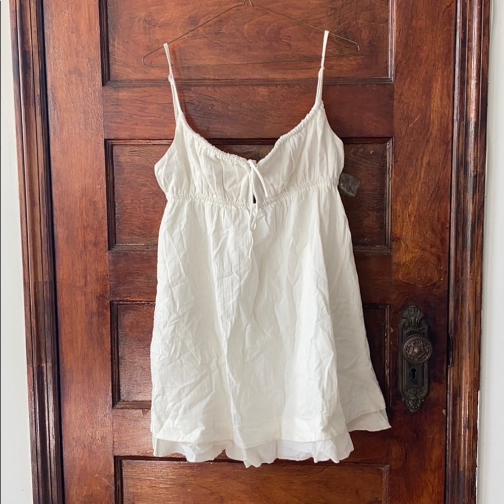 Cute white sleeveless summer dress